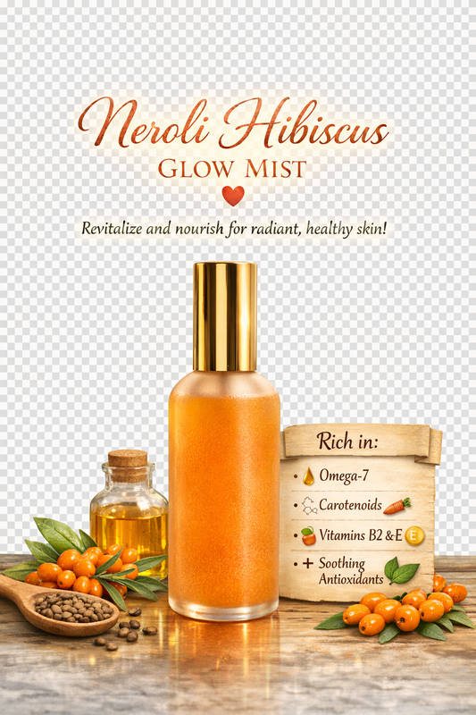 Neroli Hibiscus Glow Mist bottle with ingredients on a wooden surface